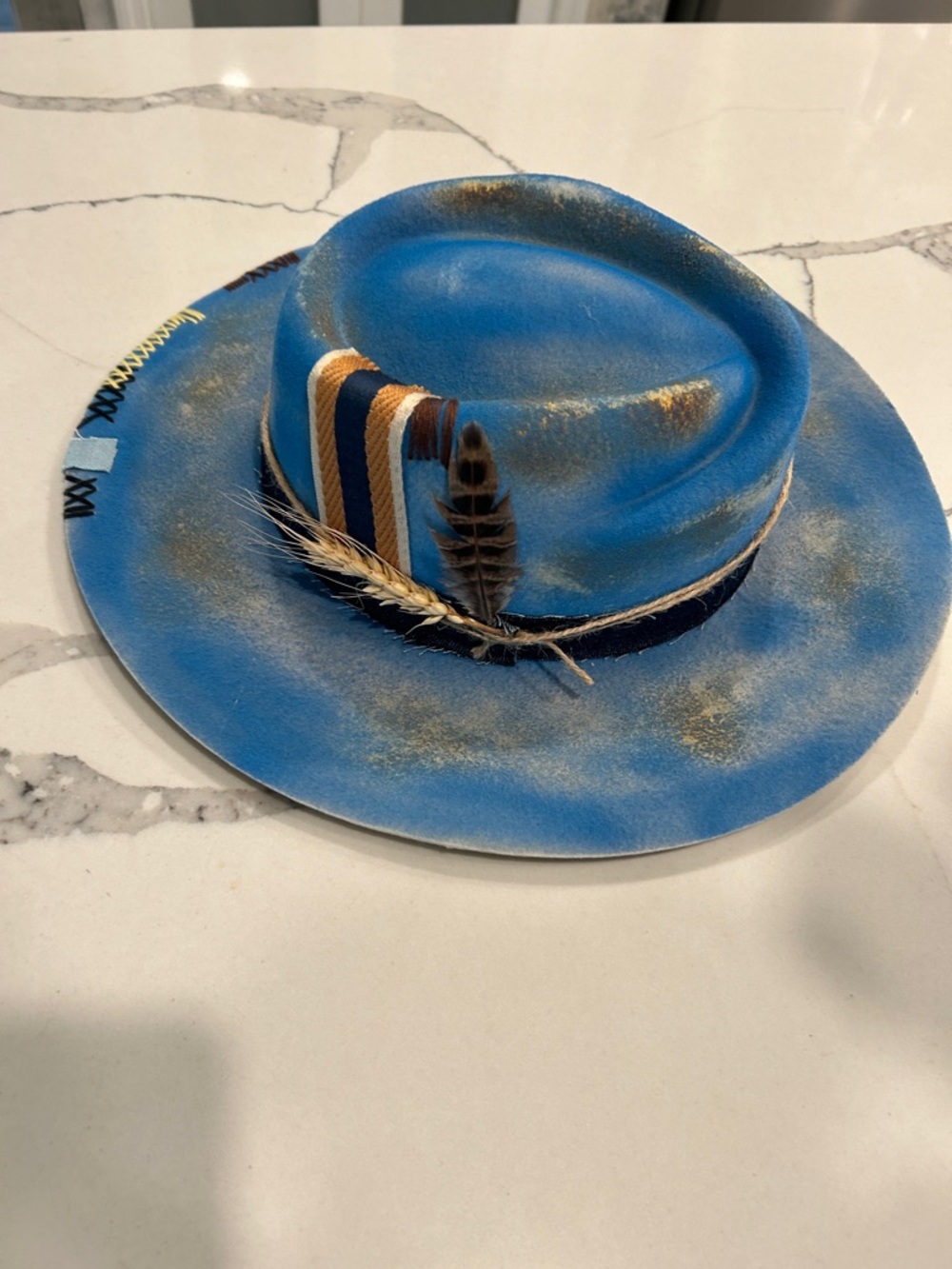 Blue Felt Fedora with Feather and Woven Band woman’s hat